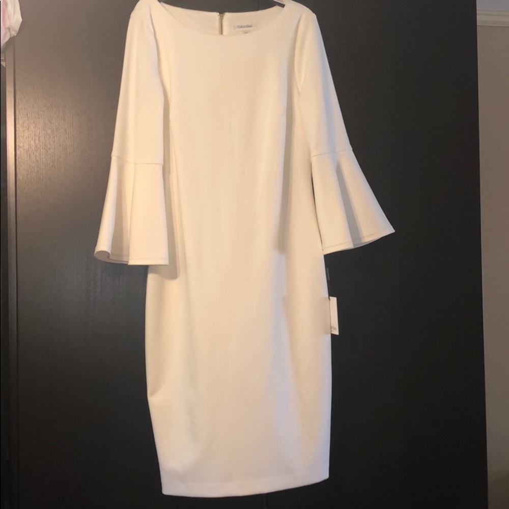 Off white dress with flared arms